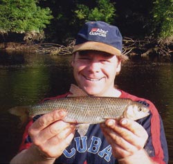 A smiling Terry Jackson with his 0.362kg dace from the River Nore, August 2002.