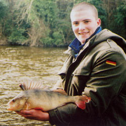 Gary Doyle with a 3 lb 6 oz perch from the River Barrow, February 2003