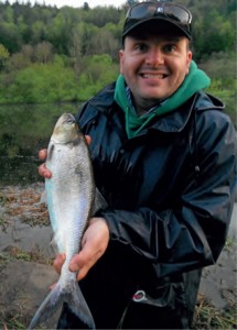 A happy Kevin McClean with a Shad prior to returning it alive, 2012